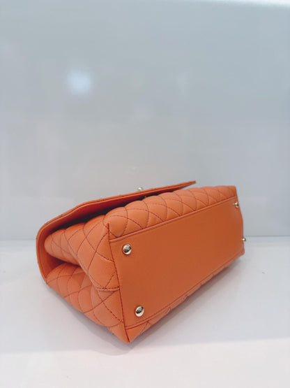 ORANGE QUILTED CAVIAR LEATHER MEDIUM COCO TOP HANDLE BAG