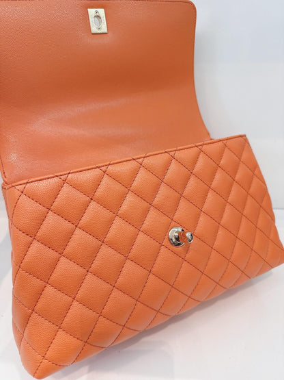 ORANGE QUILTED CAVIAR LEATHER MEDIUM COCO TOP HANDLE BAG