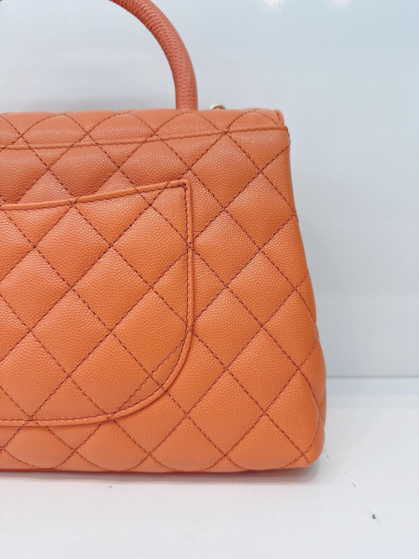 ORANGE QUILTED CAVIAR LEATHER MEDIUM COCO TOP HANDLE BAG