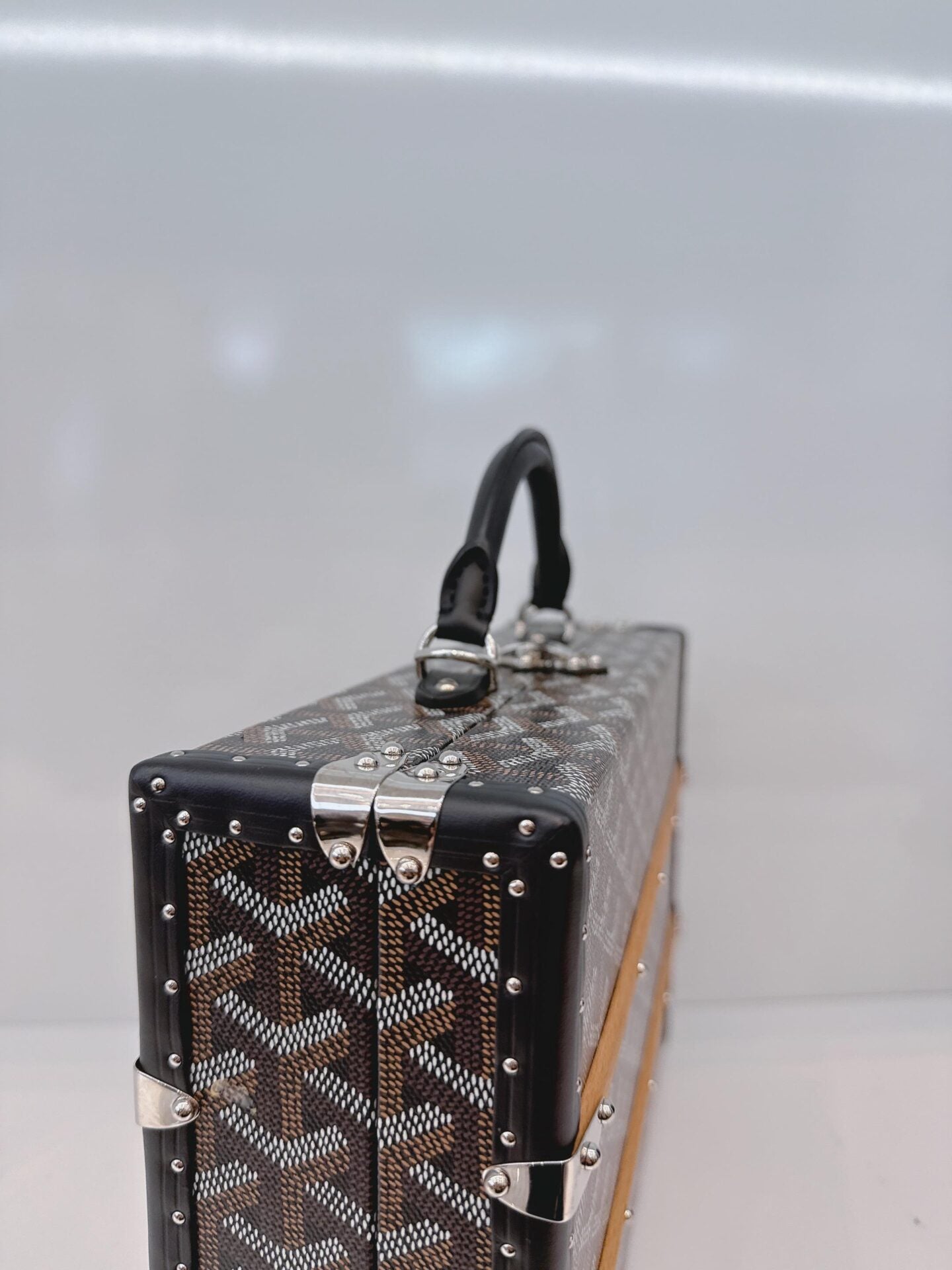 BLACK GOYARDINE COATED CANVAS PALACE MM TRUNK BAG