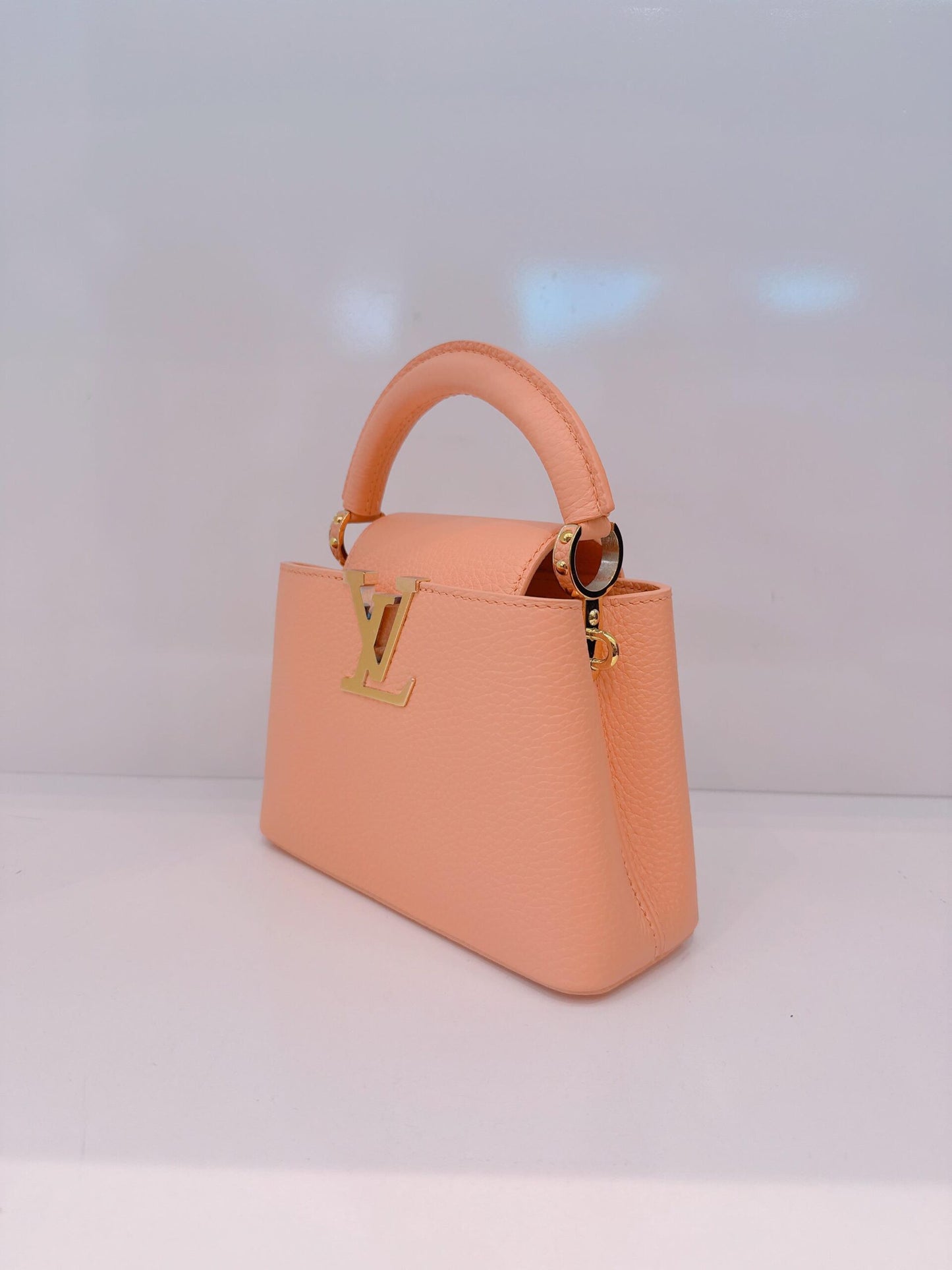 APRICOT TAURILLON LEATHER MINI CAPUCINES