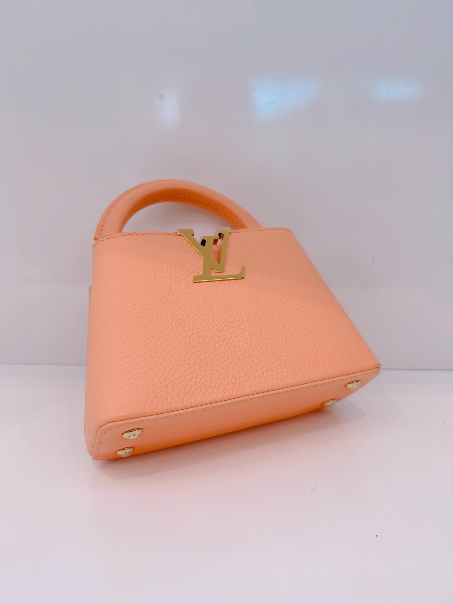 APRICOT TAURILLON LEATHER MINI CAPUCINES