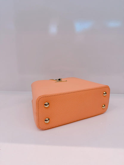 APRICOT TAURILLON LEATHER MINI CAPUCINES