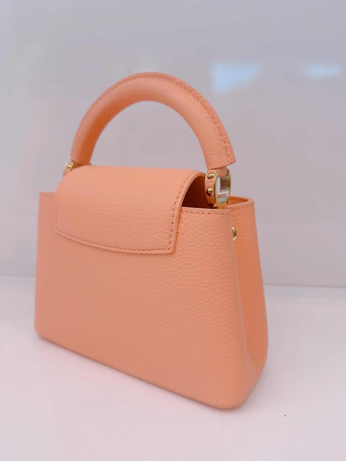 APRICOT TAURILLON LEATHER MINI CAPUCINES