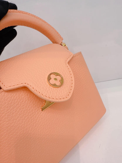APRICOT TAURILLON LEATHER MINI CAPUCINES