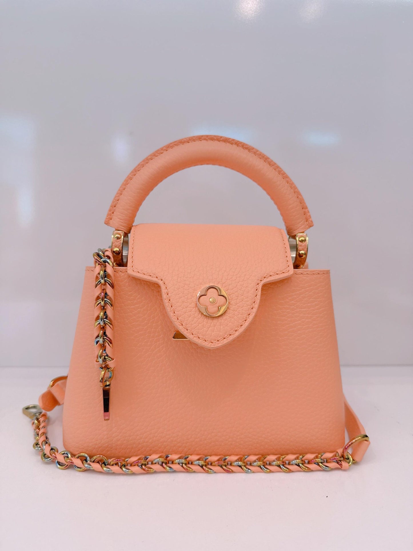 APRICOT TAURILLON LEATHER MINI CAPUCINES