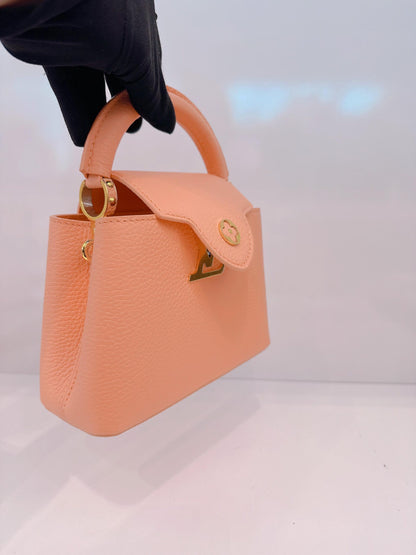 APRICOT TAURILLON LEATHER MINI CAPUCINES
