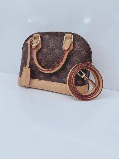 BROWN MONOGRAM CANVAS ALMA BB BAG