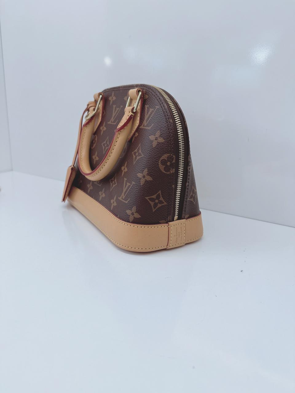 BROWN MONOGRAM CANVAS ALMA BB BAG