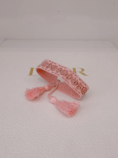 PINK OBLIQUE MELACOTTON MOTIF TASSEL BRACELET