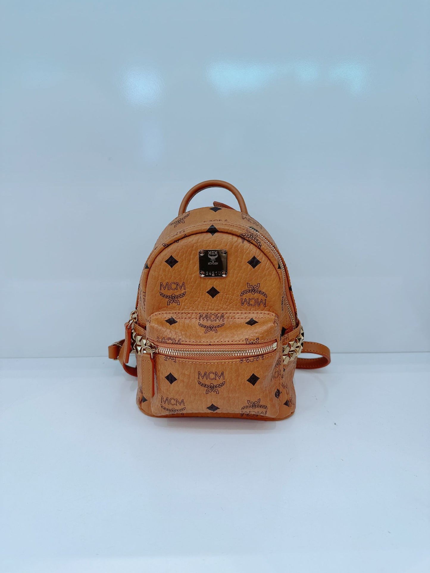 BROWN LEATHER MINI STARK SIDE STUDS BACKPACK