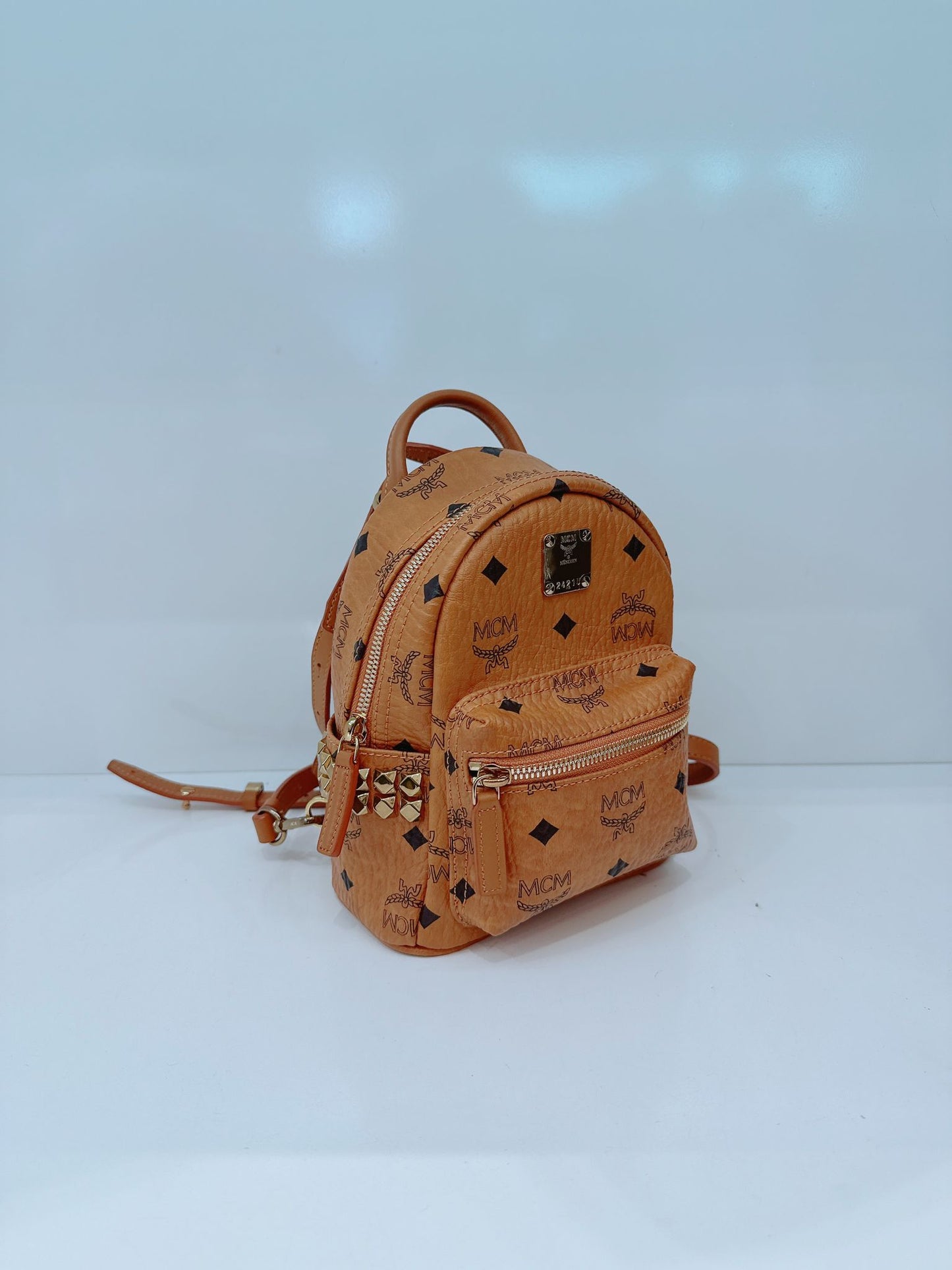 BROWN LEATHER MINI STARK SIDE STUDS BACKPACK