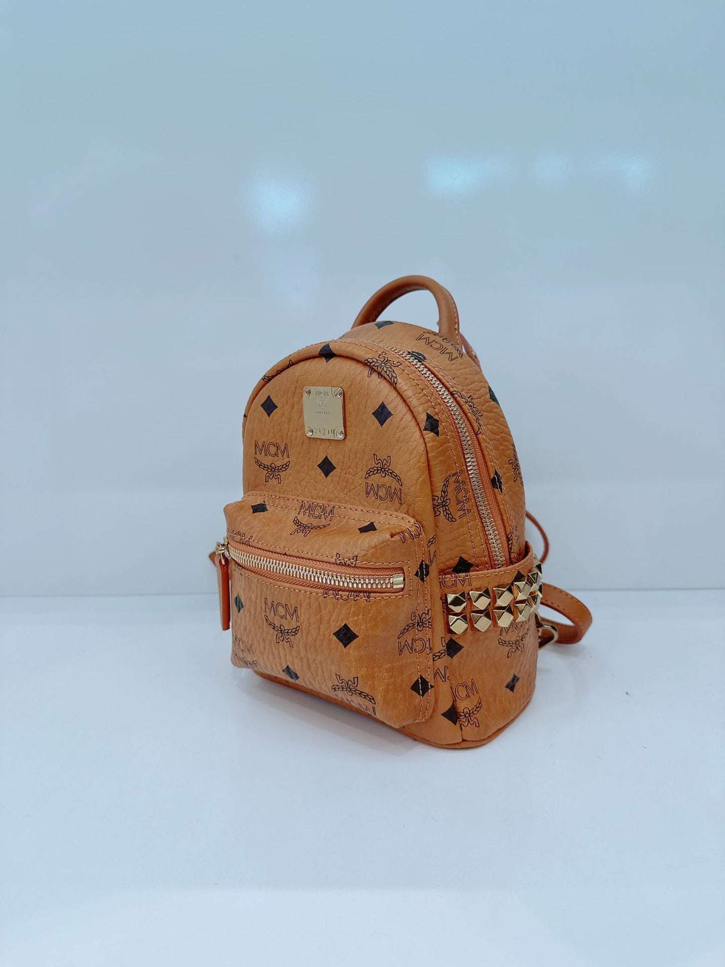 BROWN LEATHER MINI STARK SIDE STUDS BACKPACK