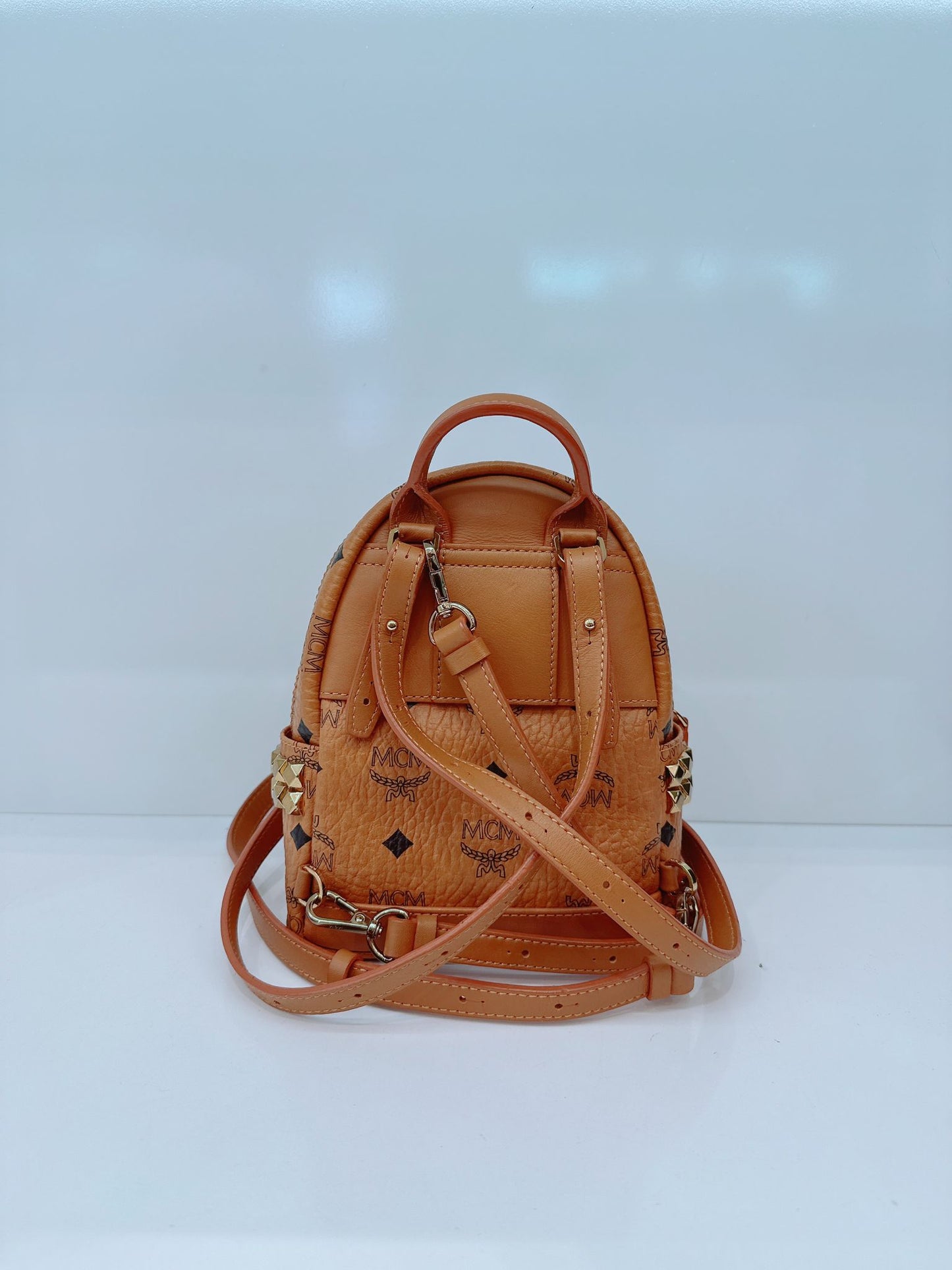 BROWN LEATHER MINI STARK SIDE STUDS BACKPACK