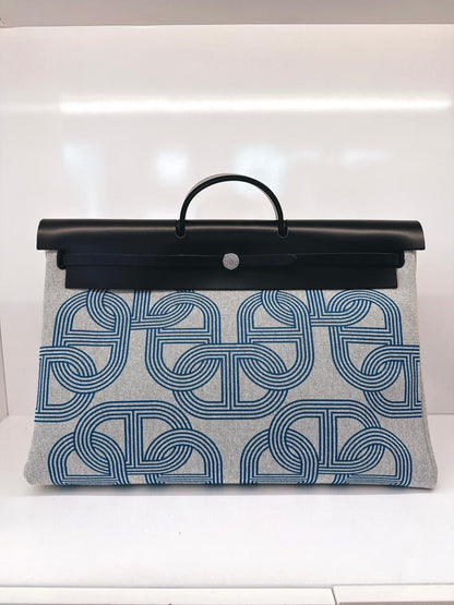 ECRU/BLEU ZELLIGE/NOIR H PLUME CANVAS WITH EBENE HUNTER LEATHER HERBAG ZIP CABINE 50 TRAVEL BAG
