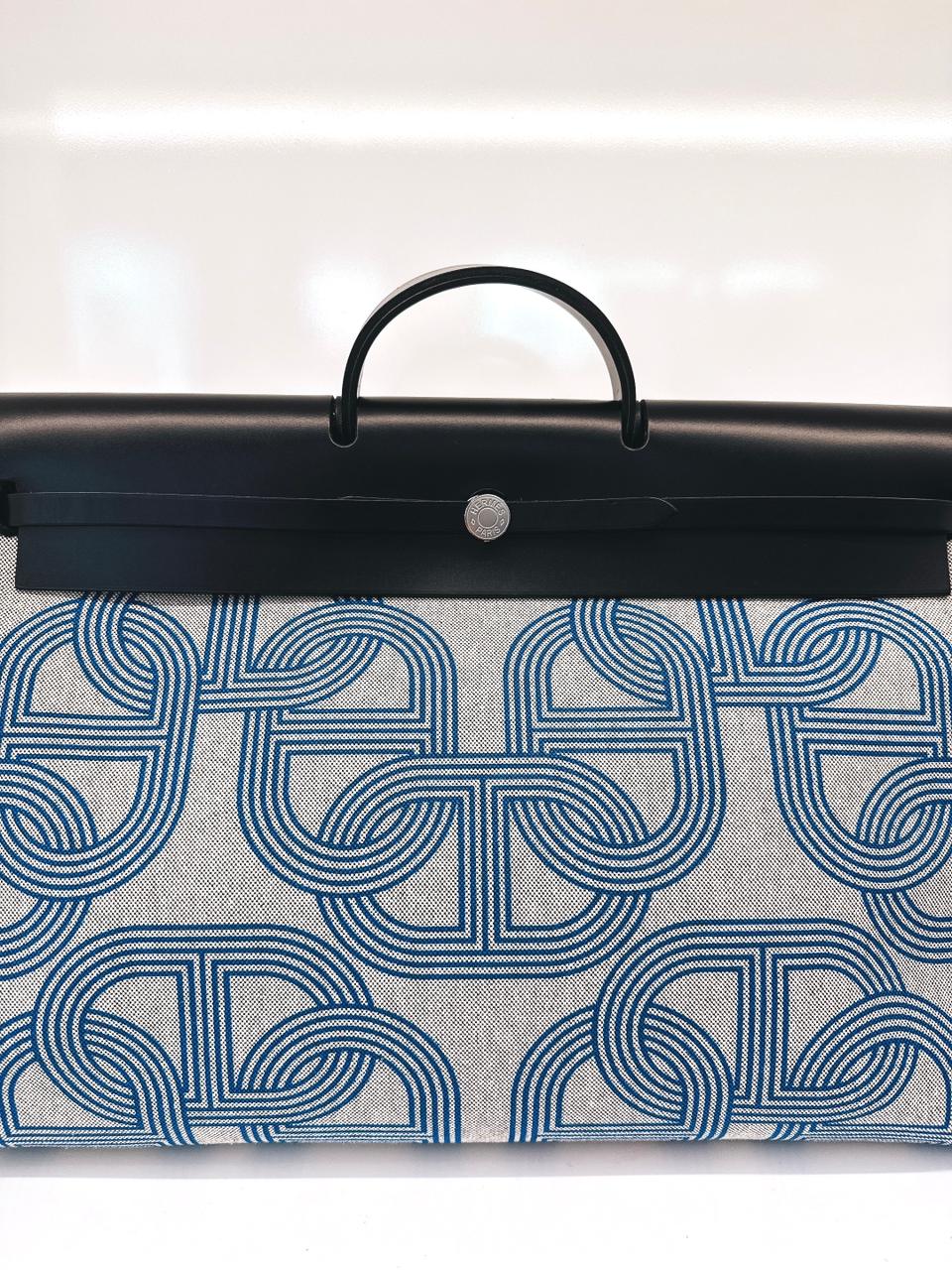 ECRU/BLEU ZELLIGE/NOIR H PLUME CANVAS WITH EBENE HUNTER LEATHER HERBAG ZIP CABINE 50 TRAVEL BAG