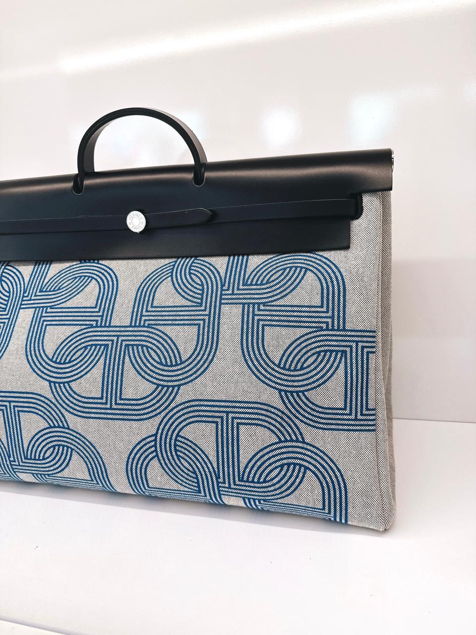 ECRU/BLEU ZELLIGE/NOIR H PLUME CANVAS WITH EBENE HUNTER LEATHER HERBAG ZIP CABINE 50 TRAVEL BAG