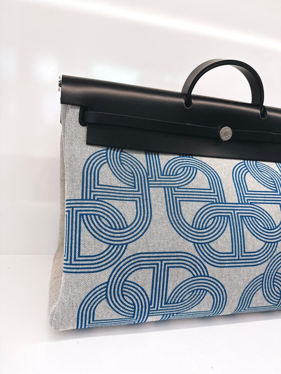 ECRU/BLEU ZELLIGE/NOIR H PLUME CANVAS WITH EBENE HUNTER LEATHER HERBAG ZIP CABINE 50 TRAVEL BAG