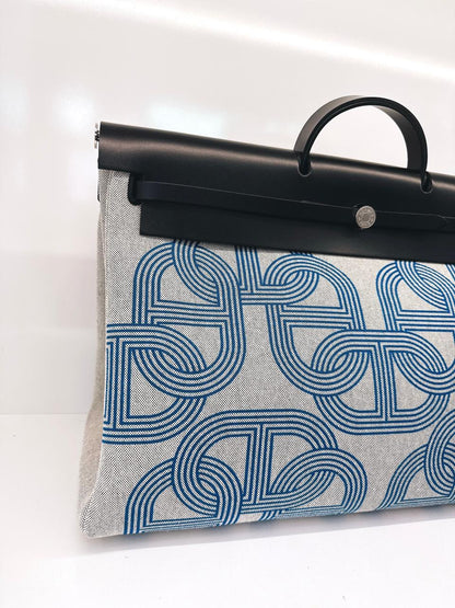 ECRU/BLEU ZELLIGE/NOIR H PLUME CANVAS WITH EBENE HUNTER LEATHER HERBAG ZIP CABINE 50 TRAVEL BAG