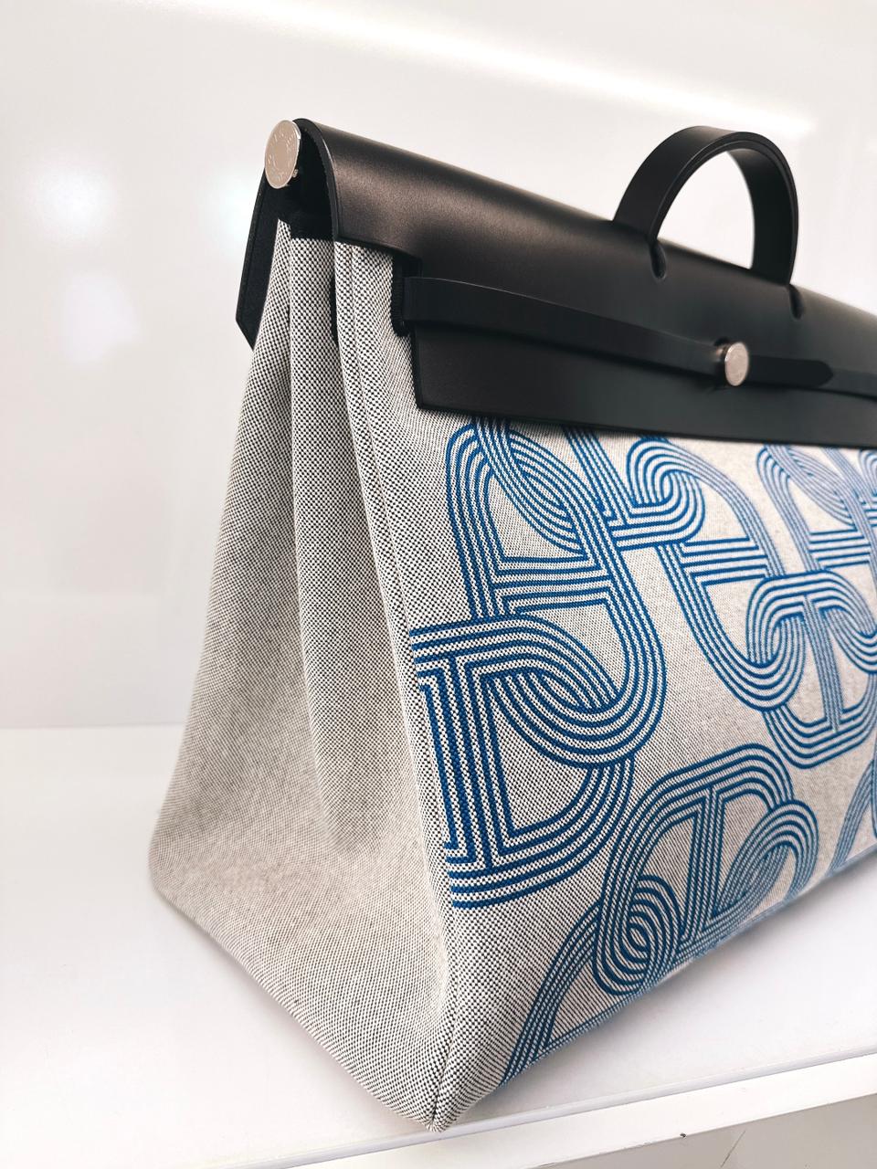 ECRU/BLEU ZELLIGE/NOIR H PLUME CANVAS WITH EBENE HUNTER LEATHER HERBAG ZIP CABINE 50 TRAVEL BAG