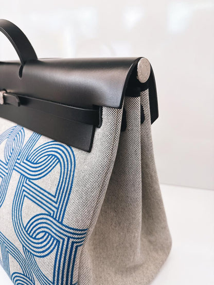 ECRU/BLEU ZELLIGE/NOIR H PLUME CANVAS WITH EBENE HUNTER LEATHER HERBAG ZIP CABINE 50 TRAVEL BAG