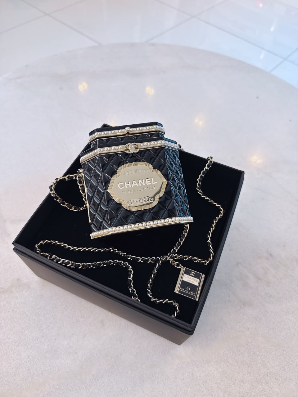 LIMITED EDITION BLACK QUILTED RESIN TEA BOX MINAUDIERE IMITATION PEARL GOLD HARDWARE