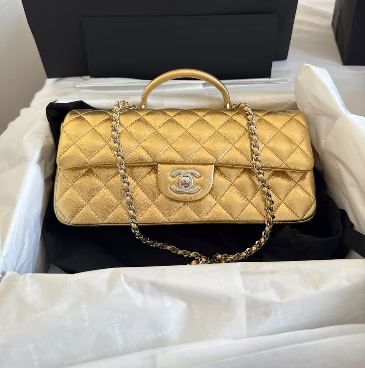 GOLD METALLIC CAVIAR QUILTED CLASSIC TOP HANDLE EAST WEST FLAP BAG