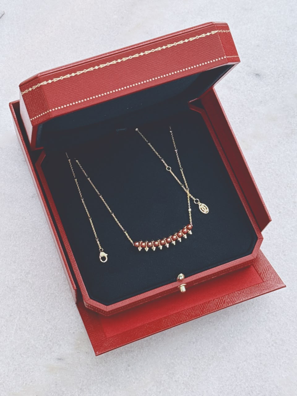 18K ROSE GOLD CLASH DE CARTIER PENDANT, AGATE