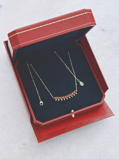 18K ROSE GOLD CLASH DE CARTIER PENDANT, AGATE