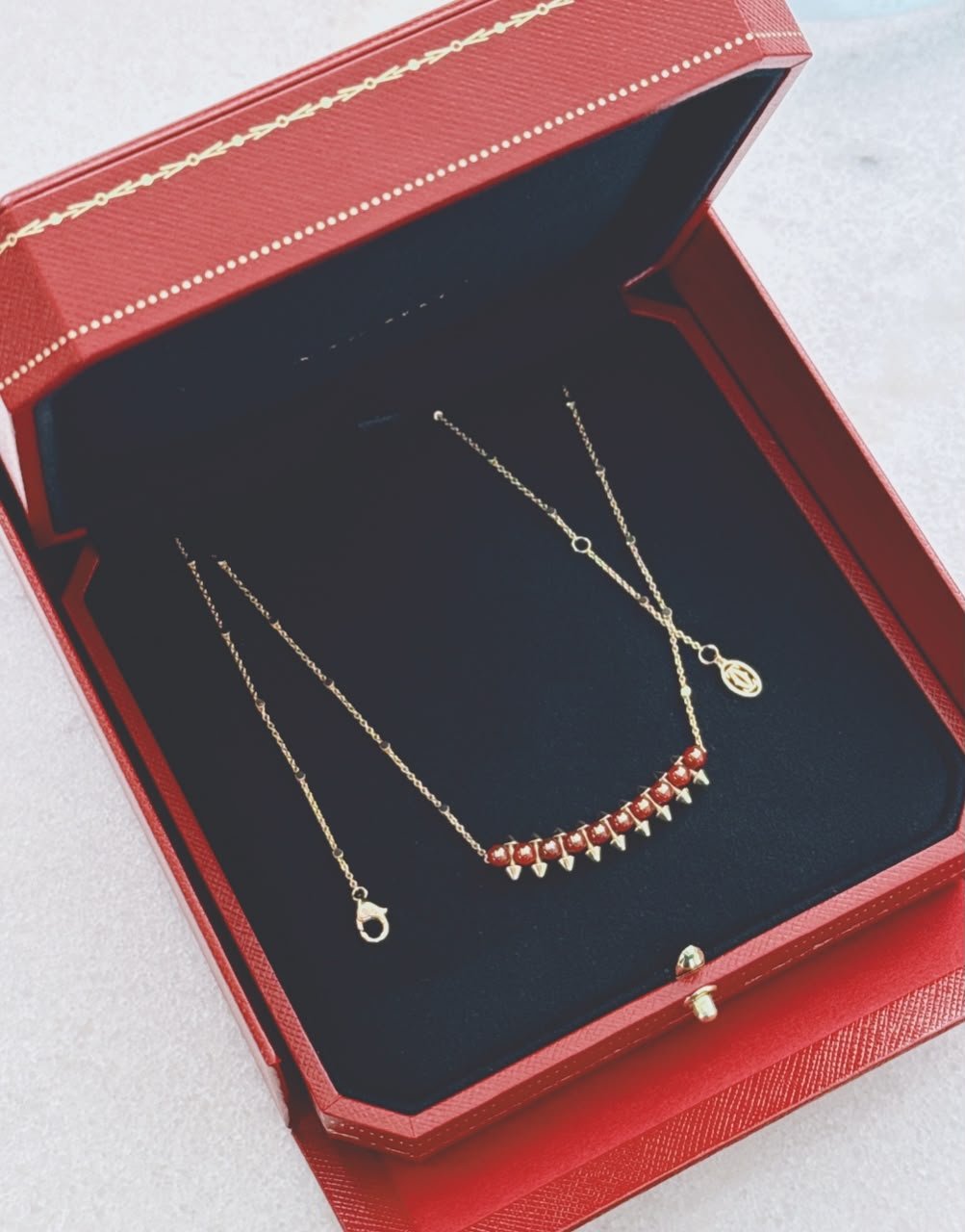 18K ROSE GOLD CLASH DE CARTIER PENDANT, AGATE