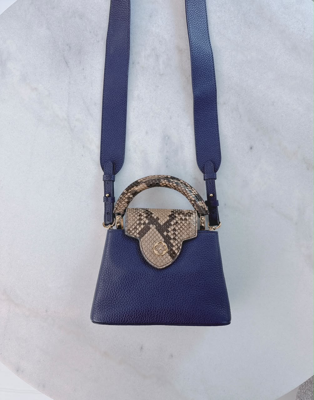 NAVY BLUE MINI CAPUCINES PYTHON TOP HANDLE BAG