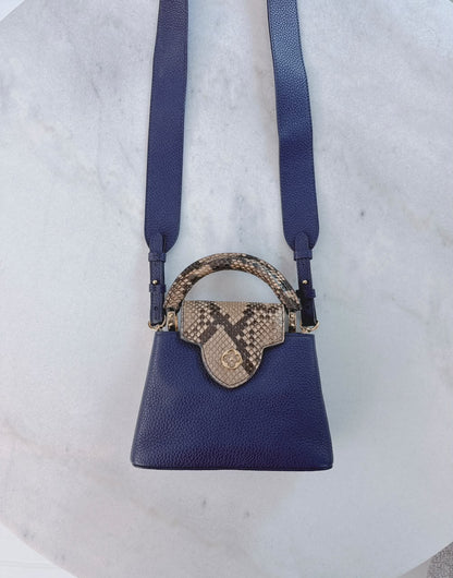 NAVY BLUE MINI CAPUCINES PYTHON TOP HANDLE BAG