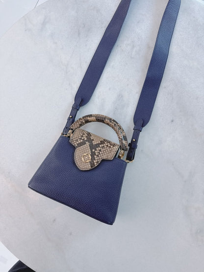 NAVY BLUE MINI CAPUCINES PYTHON TOP HANDLE BAG