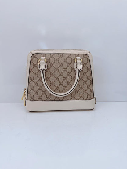 SMALL GUCCI HORSEBIT TOP HANDLE BAG IN GG SUPREME CANVAS