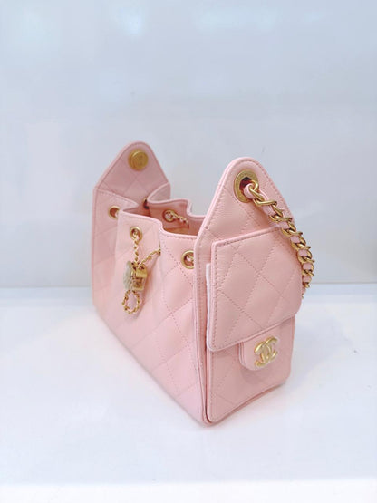 LIGHT PINK MINI CHANEL 25 HANDBAG GRAINED CALFSKIN GOLD TONE METAL HARDWARE