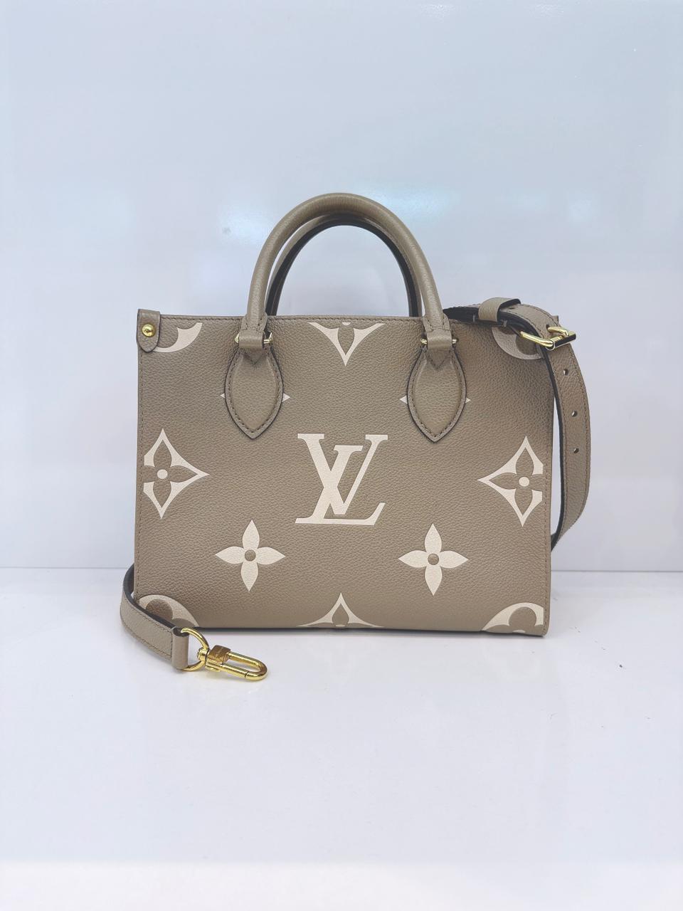 TOURTERELLE / CREAM MONOGRAM EMPREINTE LEATHER ONTHEGO PM HANDBAG