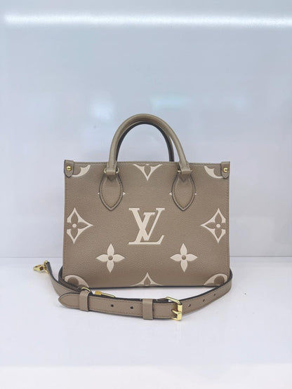 TOURTERELLE / CREAM MONOGRAM EMPREINTE LEATHER ONTHEGO PM HANDBAG