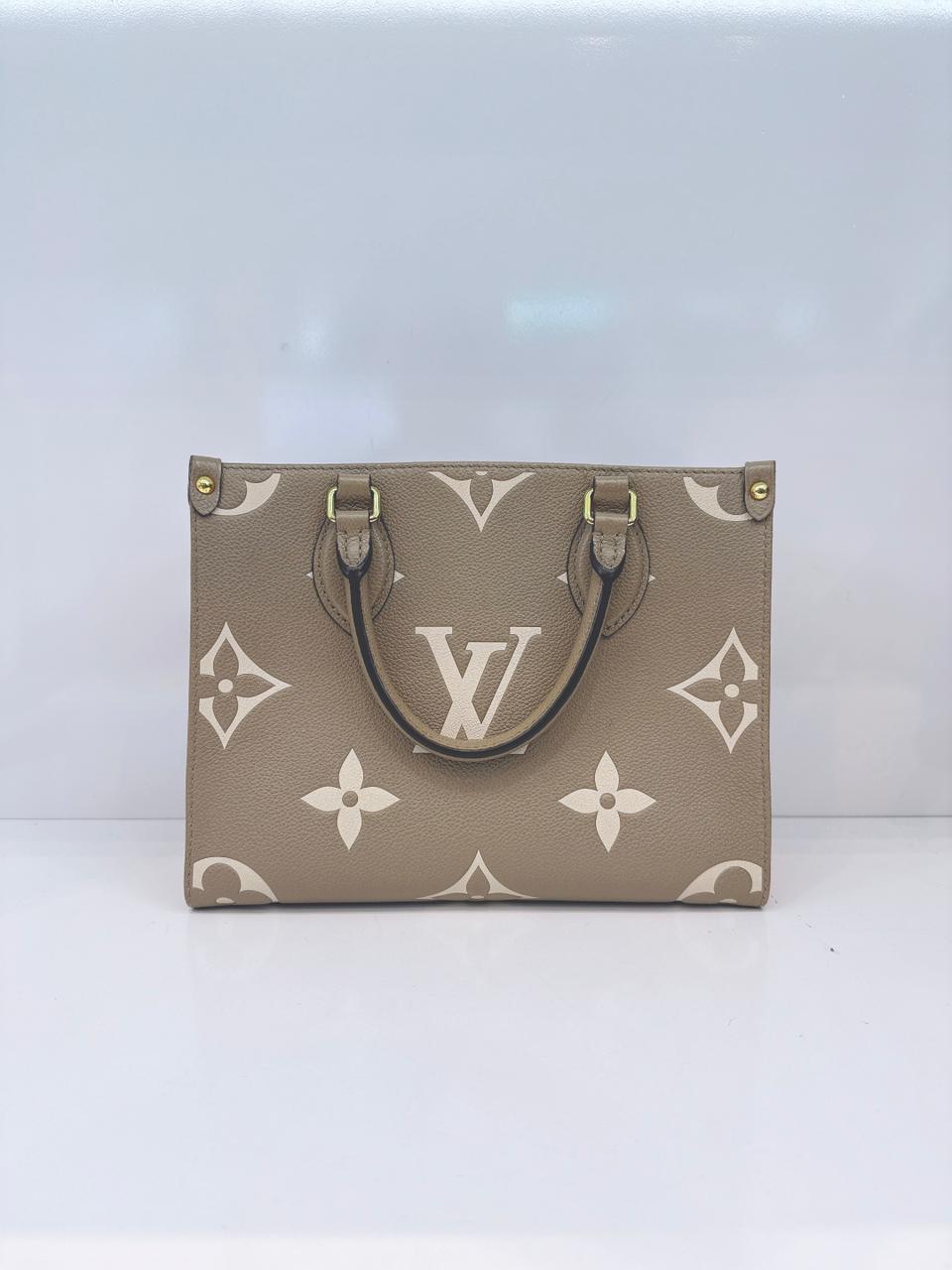 TOURTERELLE / CREAM MONOGRAM EMPREINTE LEATHER ONTHEGO PM HANDBAG