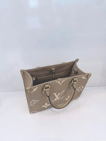 TOURTERELLE / CREAM MONOGRAM EMPREINTE LEATHER ONTHEGO PM HANDBAG