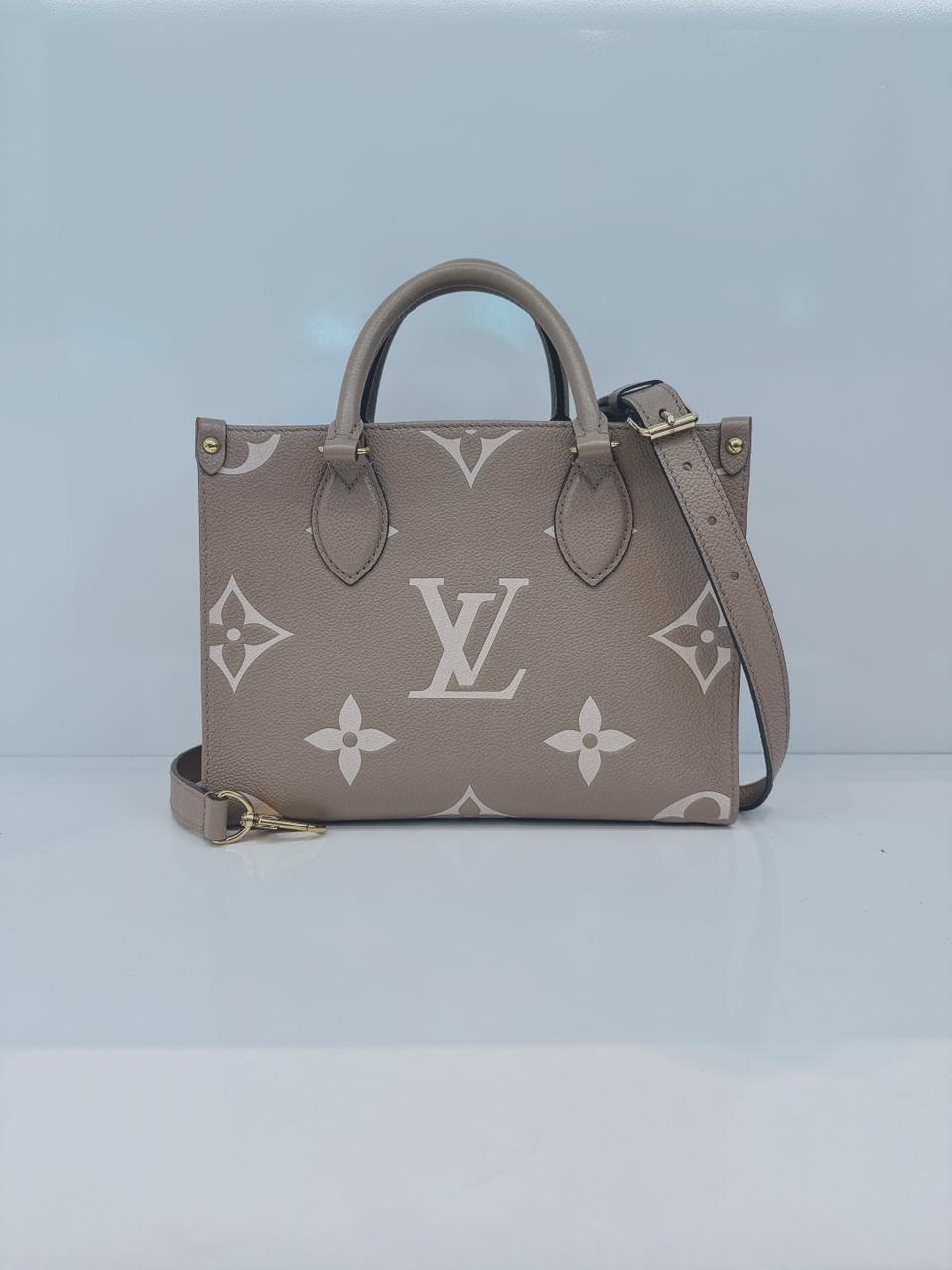 TOURTERELLE / CREAM MONOGRAM EMPREINTE LEATHER ONTHEGO PM HANDBAG