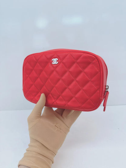 CORAL QUILTED LAMBSKIN LEATHER CURVY POUCH COSMETIC CASE