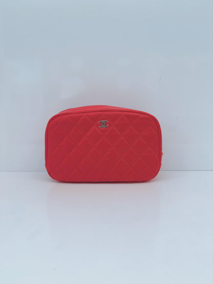 CORAL QUILTED LAMBSKIN LEATHER CURVY POUCH COSMETIC CASE