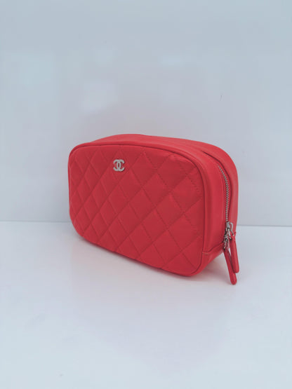 CORAL QUILTED LAMBSKIN LEATHER CURVY POUCH COSMETIC CASE