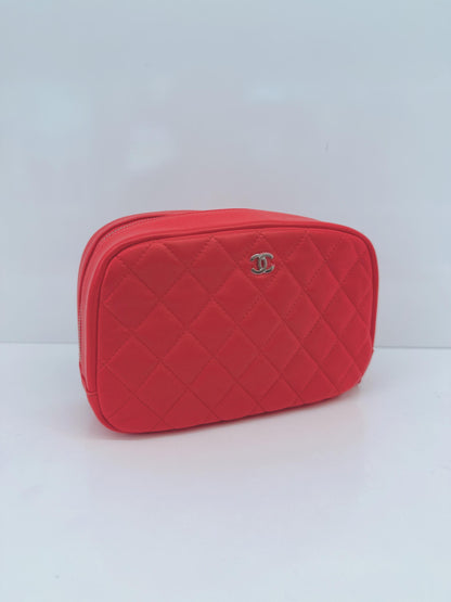CORAL QUILTED LAMBSKIN LEATHER CURVY POUCH COSMETIC CASE