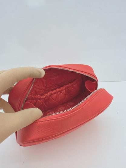CORAL QUILTED LAMBSKIN LEATHER CURVY POUCH COSMETIC CASE