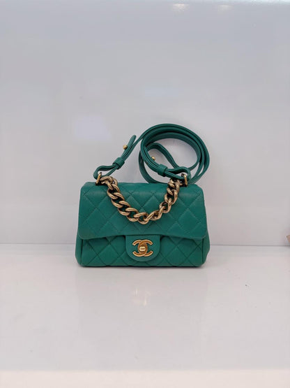 GREEN GOATSKIN TRAPEZIO TOP HANDLE MINI FLAP BAG AGED GOLD HARDWARE