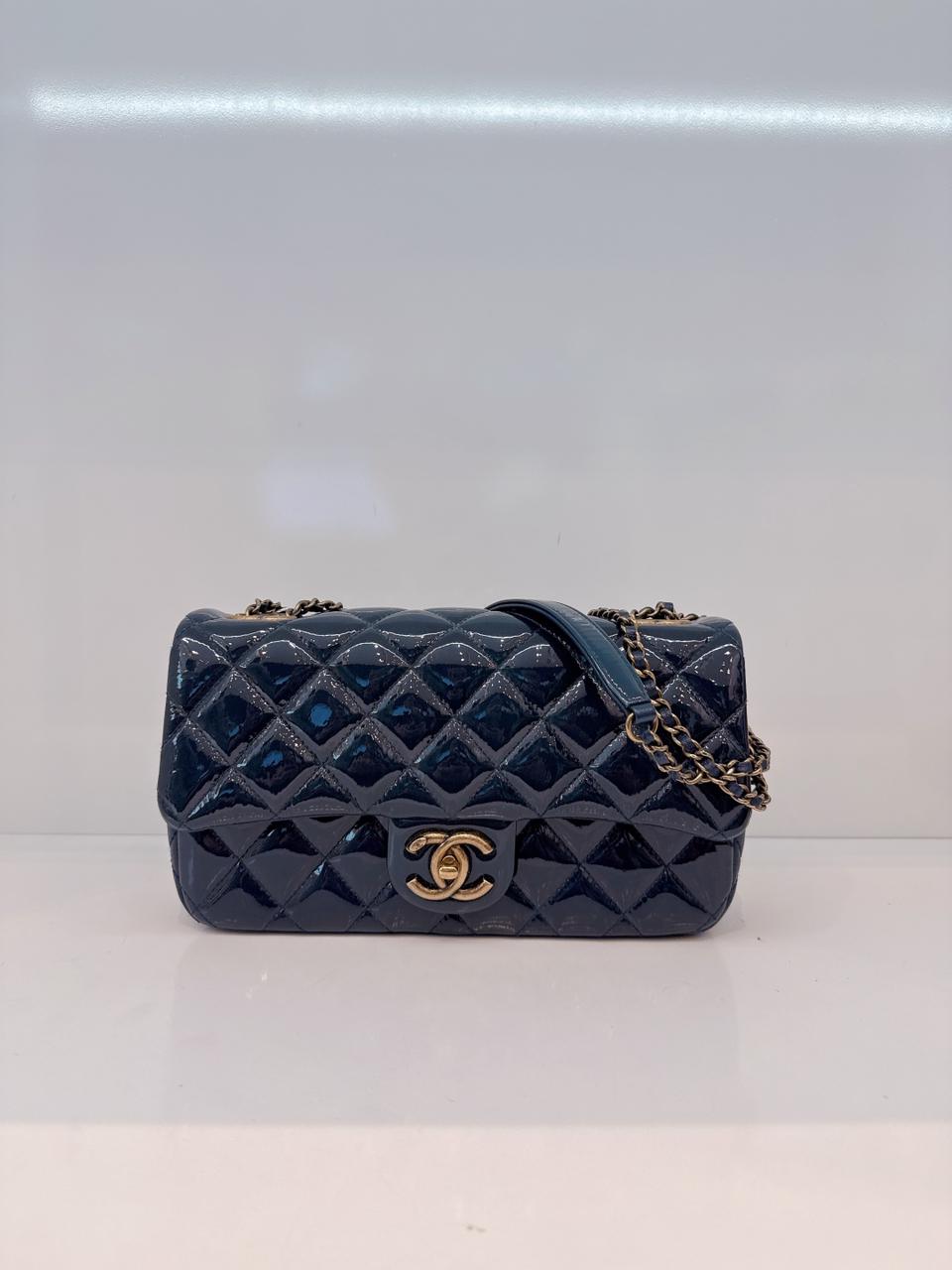CHANEL BLUE PATENT GOATSKIN QUILTED SMALL CC EYELET FLAP BAG