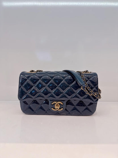 CHANEL BLUE PATENT GOATSKIN QUILTED SMALL CC EYELET FLAP BAG