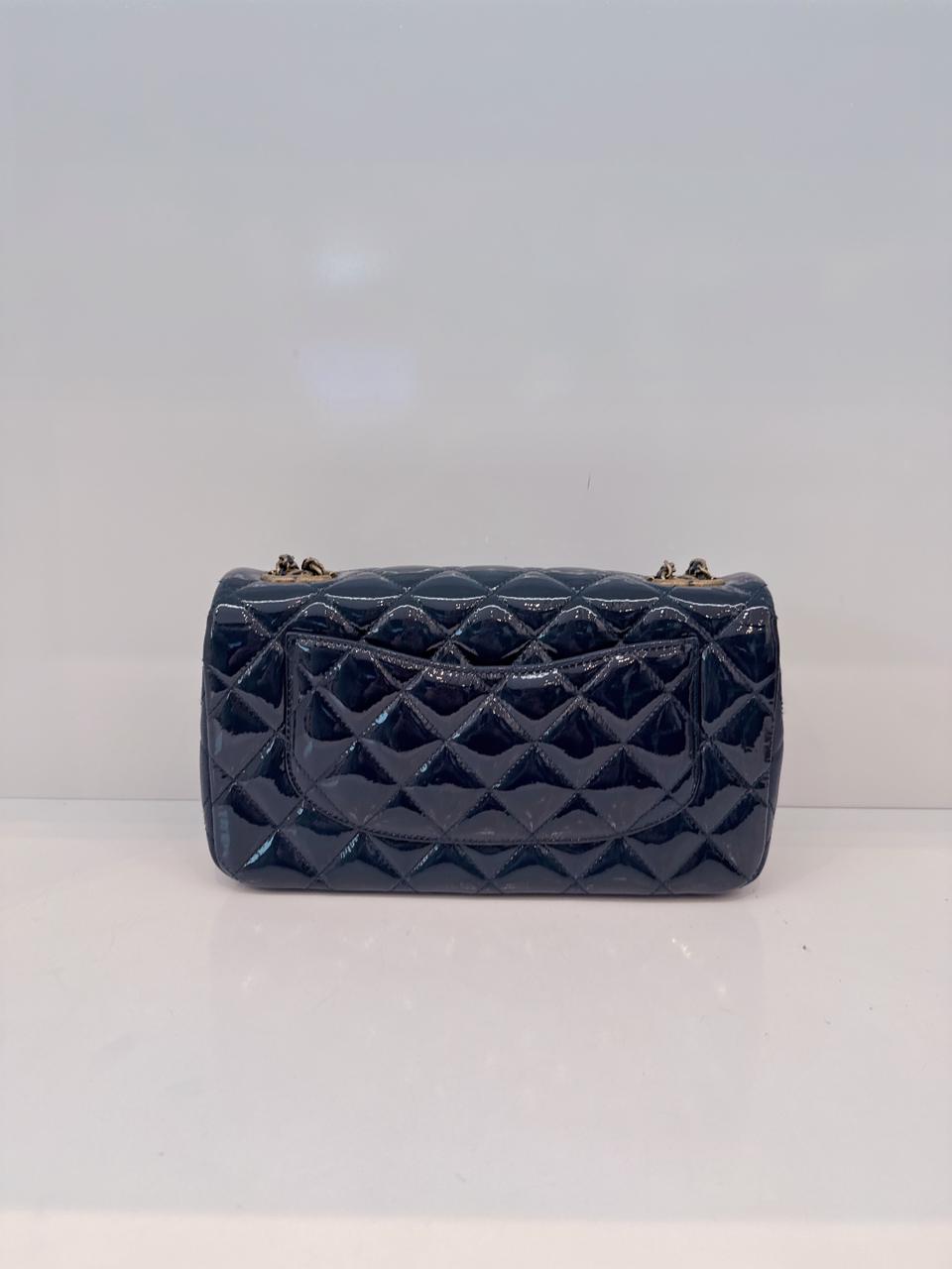 CHANEL BLUE PATENT GOATSKIN QUILTED SMALL CC EYELET FLAP BAG