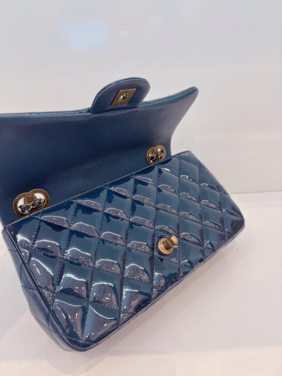 CHANEL BLUE PATENT GOATSKIN QUILTED SMALL CC EYELET FLAP BAG